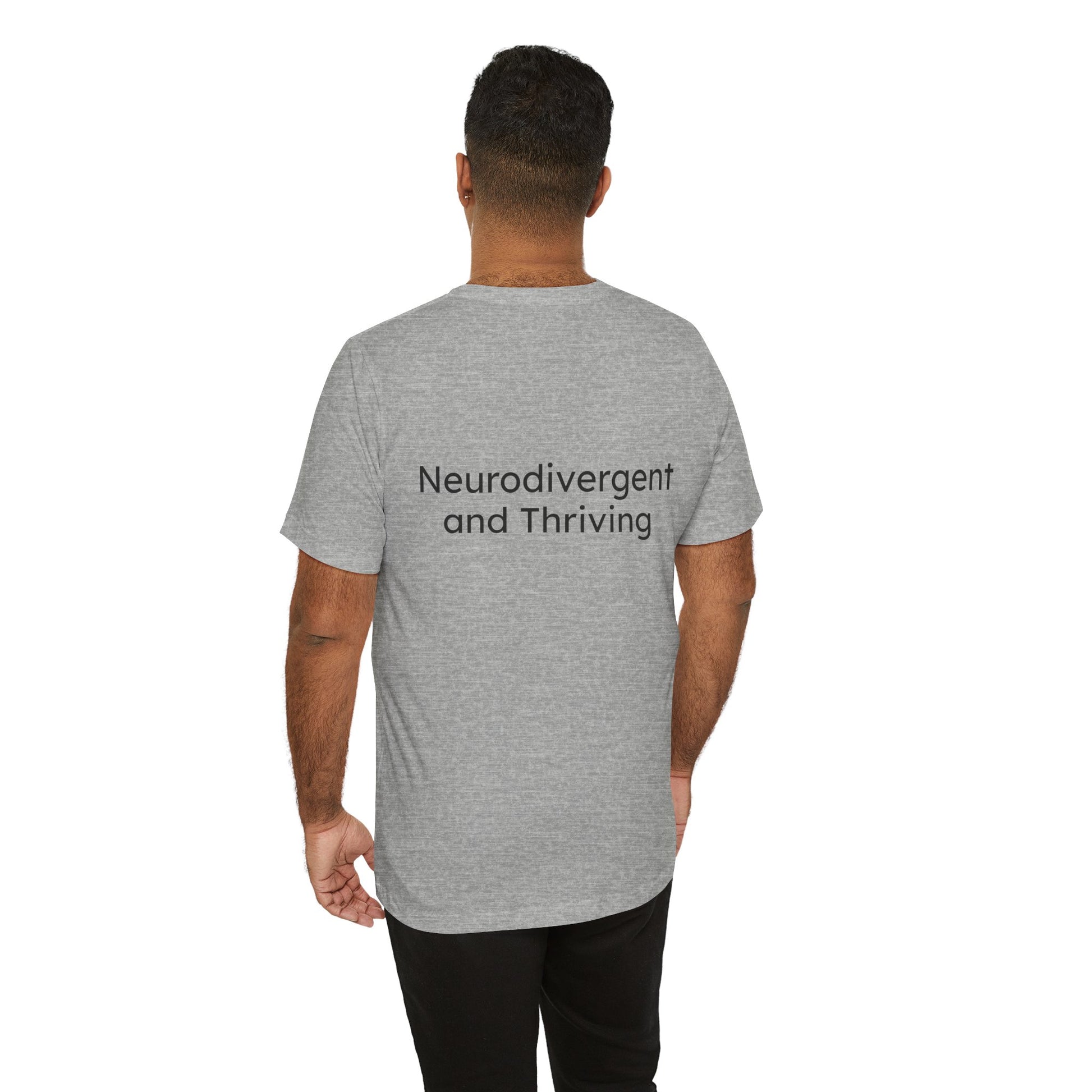 Person wearing a gray t-shirt with 'Neurodivergent and Thriving' text on the back.