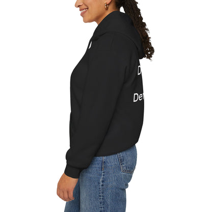 Person wearing a black hoodie with visible branding on a white background