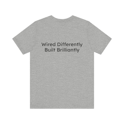 Gray t-shirt with text 'Wired Differently Built Brilliantly' on a white background