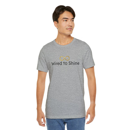 Man wearing a gray t-shirt with 'Wired to Shine' text and logo on a white background