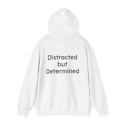 White hoodie with 'Distracted but Determined' text on a white background