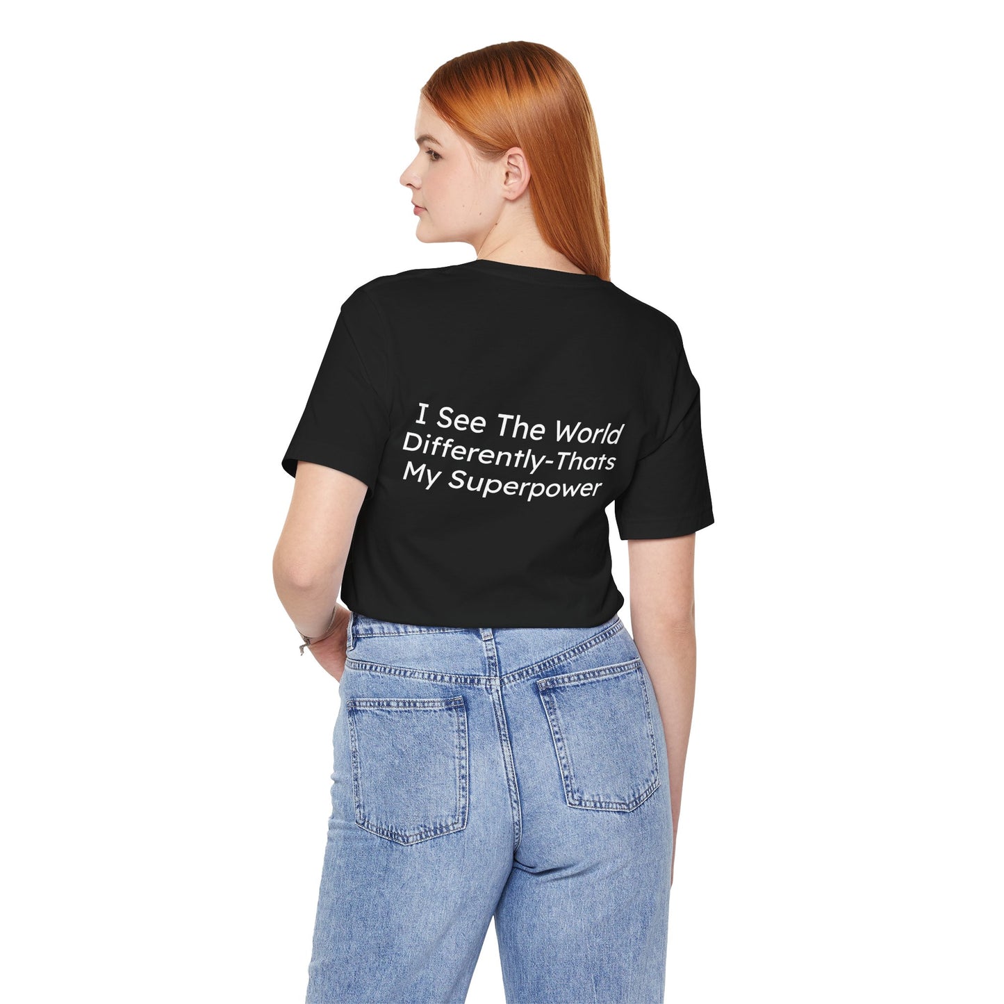 Person wearing a black t-shirt with text on the back, standing against a white background
