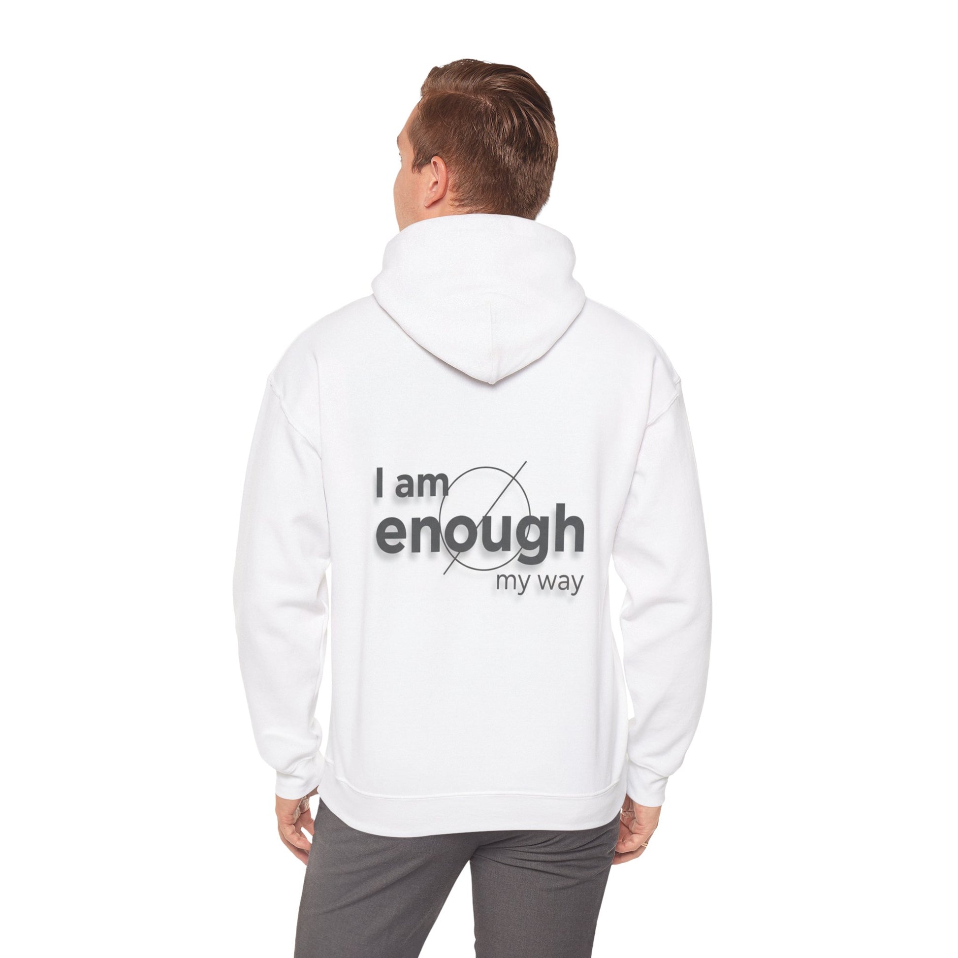 Person wearing a white hoodie with 'I am enough my way' text on the back against a white background