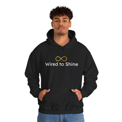 Person wearing a black hoodie with 'Wired to Shine' text and logo on a white background