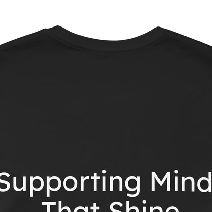 Black t-shirt with white text 'Supporting Mind That Shines' on a white background