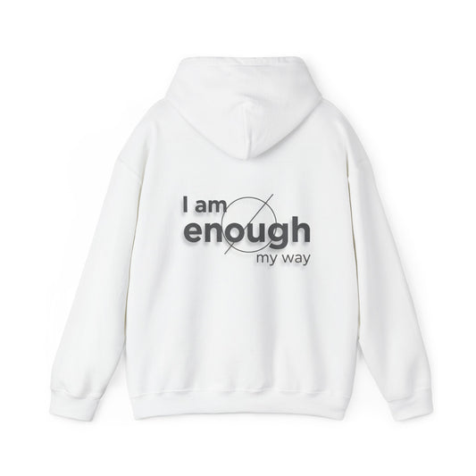 White hoodie with 'I am enough my way' text on the back against a white background