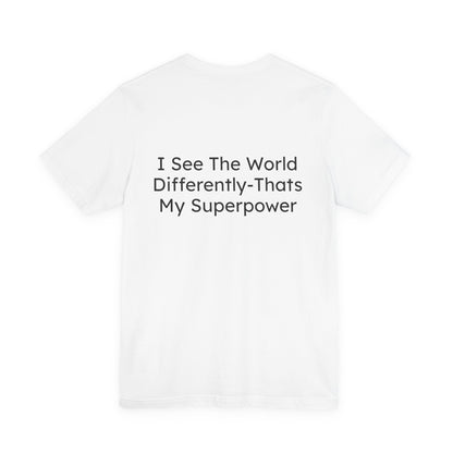 White t-shirt with black text 'I See The World Differently-That's My Superpower' on a white background