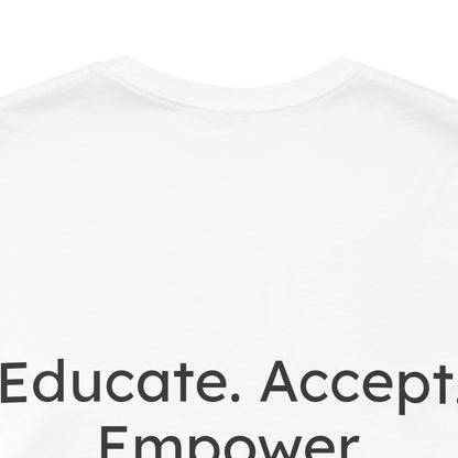 White t-shirt with motivational text 'Educate. Accept. Empower' on a white background