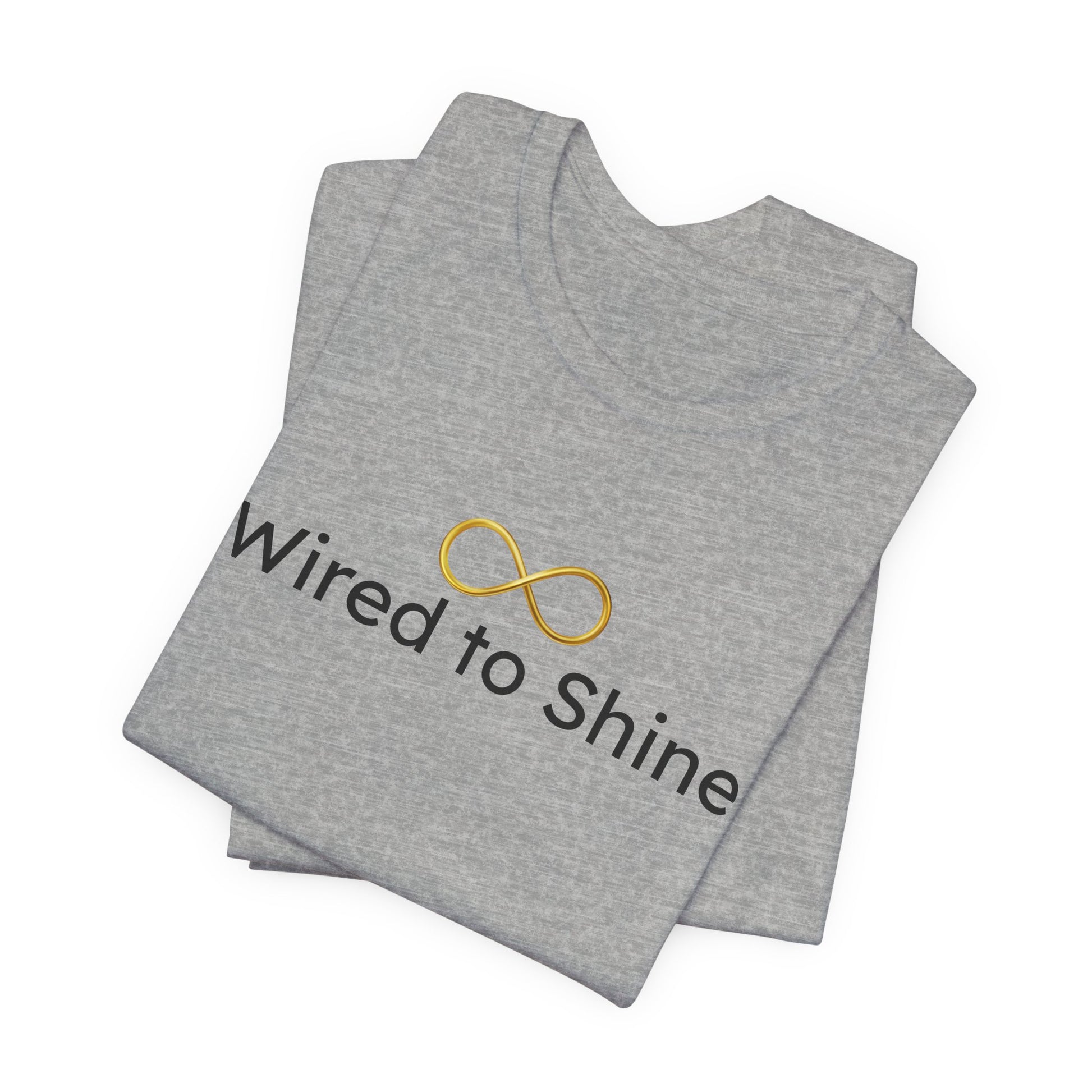 Folded gray t-shirt with 'Wired to Shine' text and logo on a white background