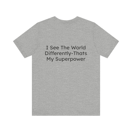 Gray t-shirt with text 'I See The World Differently-That's My Superpower' on a white background