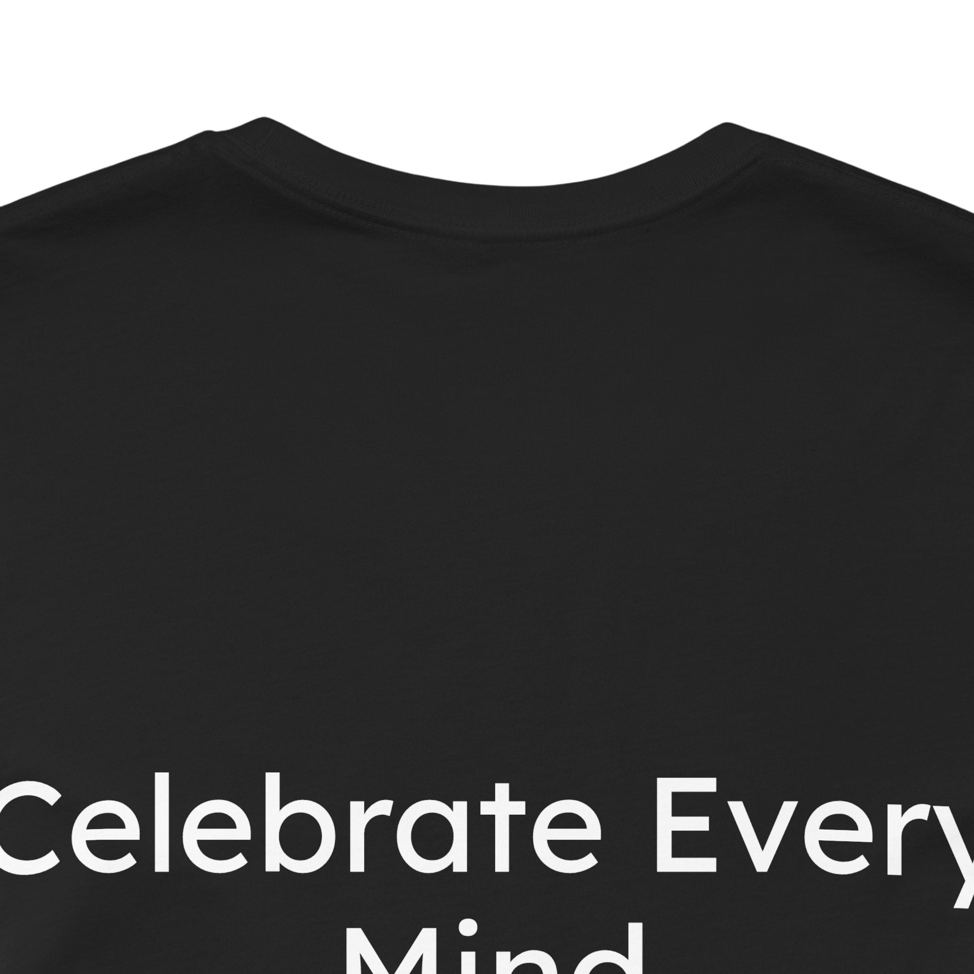 Black t-shirt with 'Celebrate Every Mind' text on a white background
