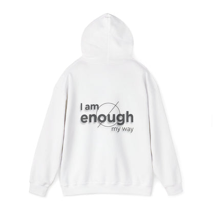 White hoodie with 'I am enough my way' text on a white background