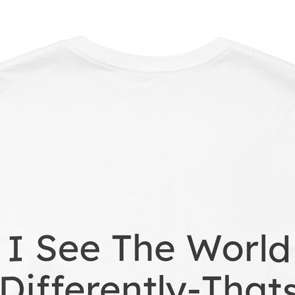 White t-shirt with text 'I See The World Differently-That's Fine' on a white background