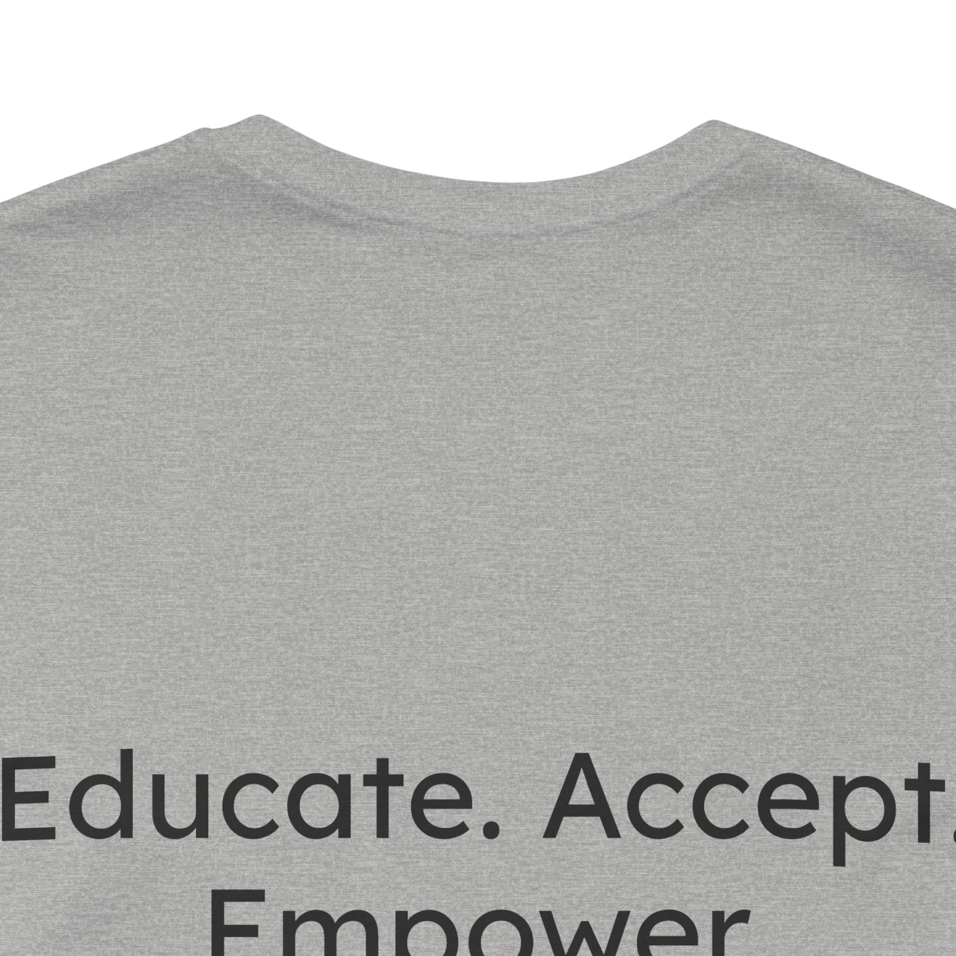 Gray t-shirt with motivational text 'Educate. Accept. Empower' on a white background