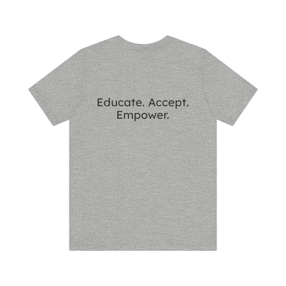 Gray t-shirt with motivational text 'Educate. Accept. Empower.' on a white background