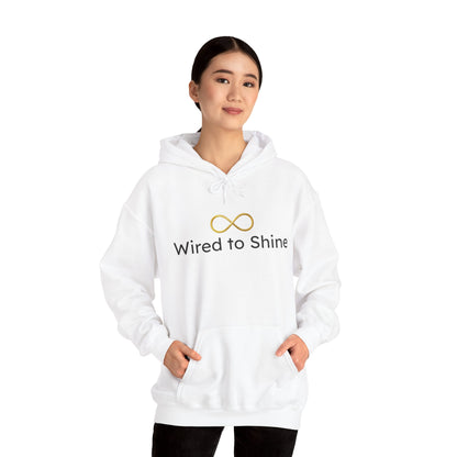 Person wearing a white hoodie with 'Wired to Shine' text and logo on a white background