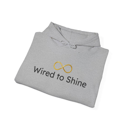 Folded gray hoodie with 'Wired to Shine' logo on a white background