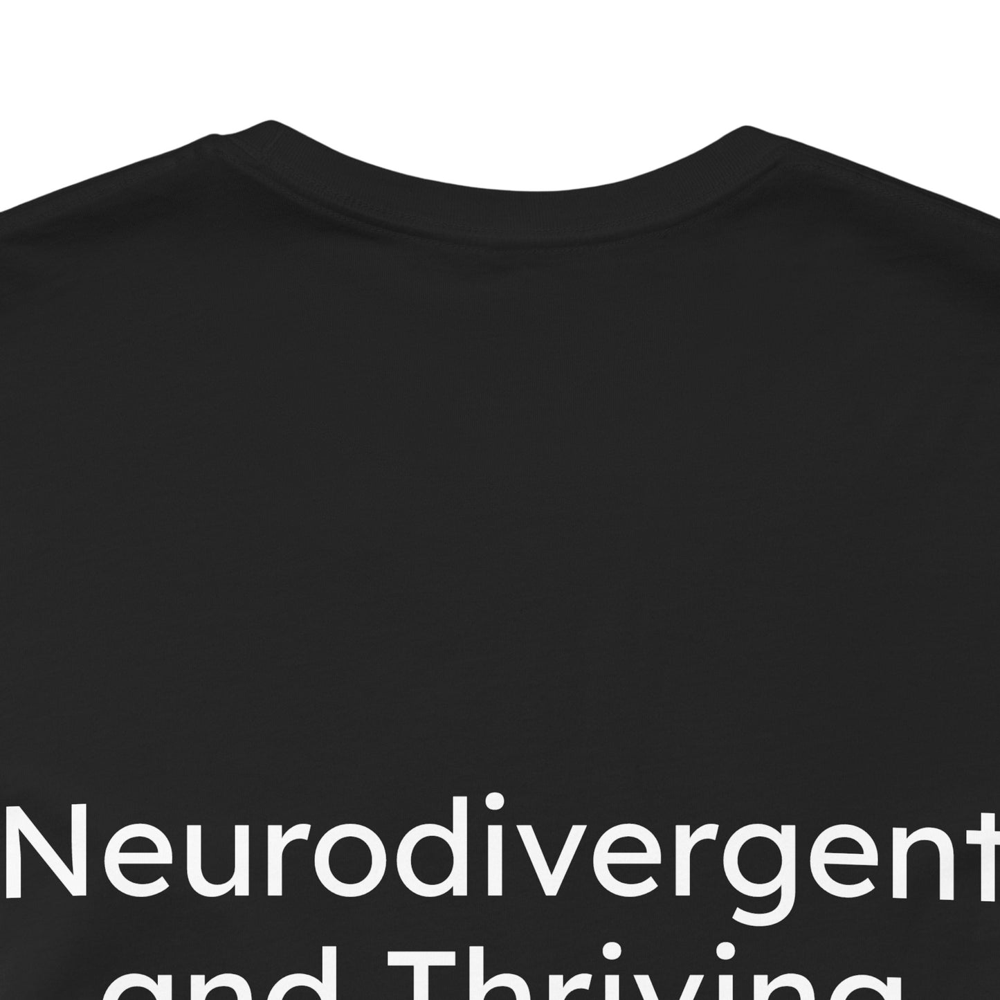 Black t-shirt with white text 'Neurodivergent and Thriving' on a white background