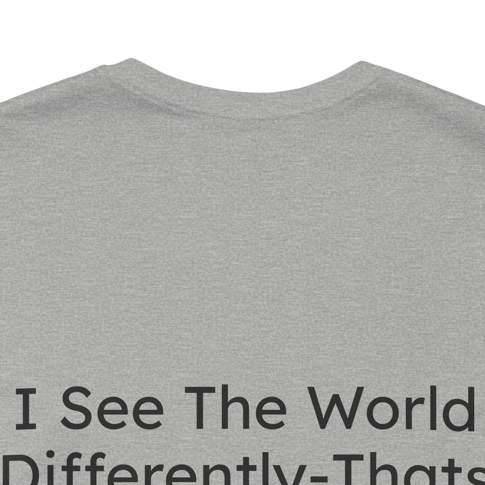 Gray t-shirt with text 'I See The World Differently-That's Fine' on a white background
