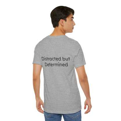Person wearing a gray t-shirt with 'Distracted but Determined' text on the back.