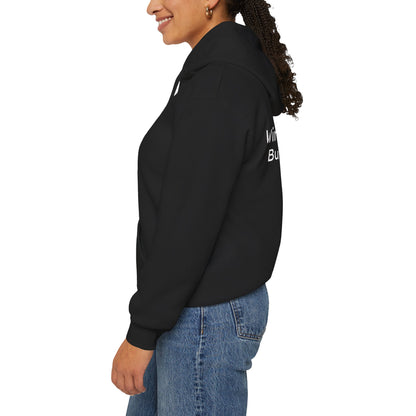 Person wearing a black hoodie with text on the back, standing against a white background