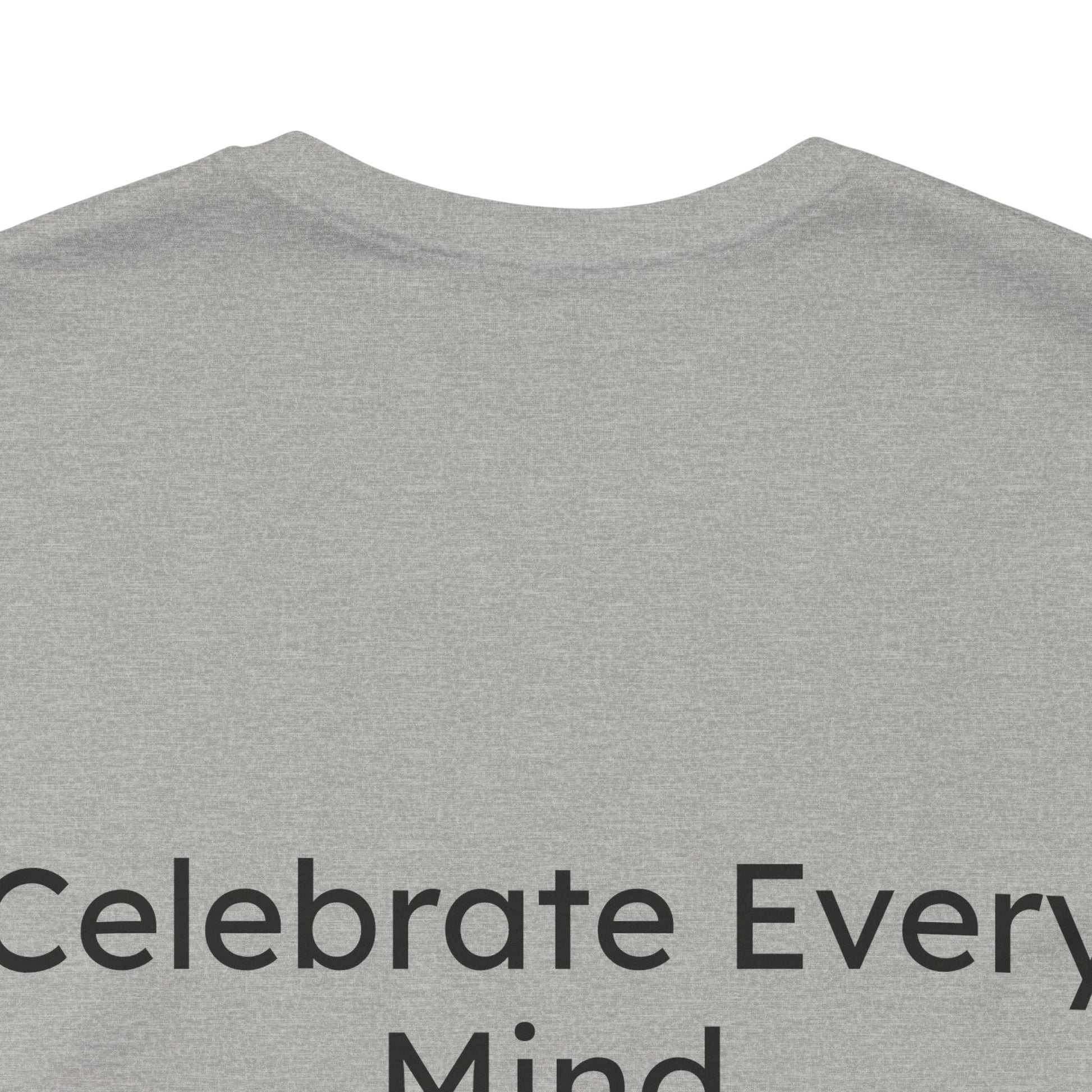 Gray t-shirt with 'Celebrate Every Mind' text on a white background