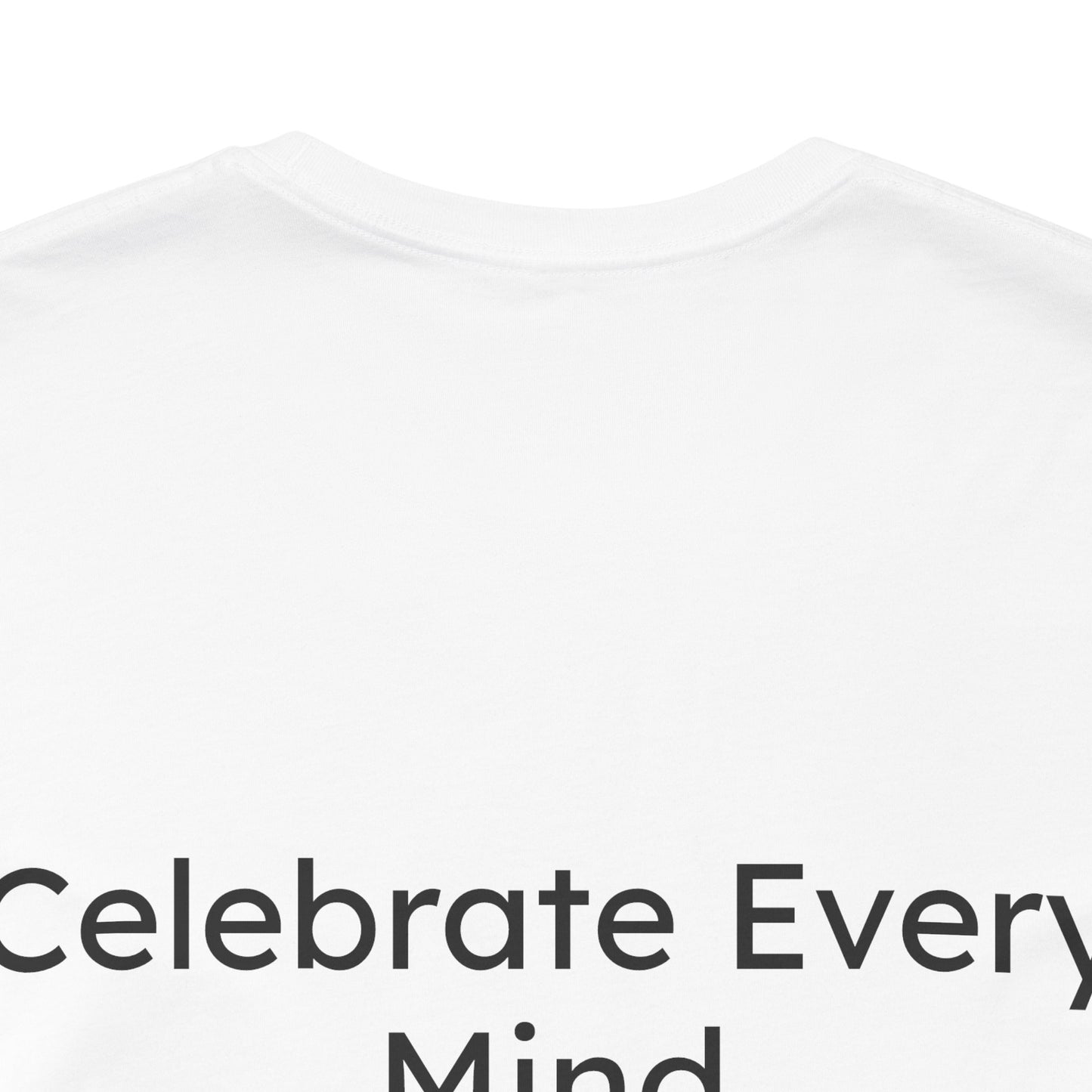 White t-shirt with 'Celebrate Every Mind' text on a white background