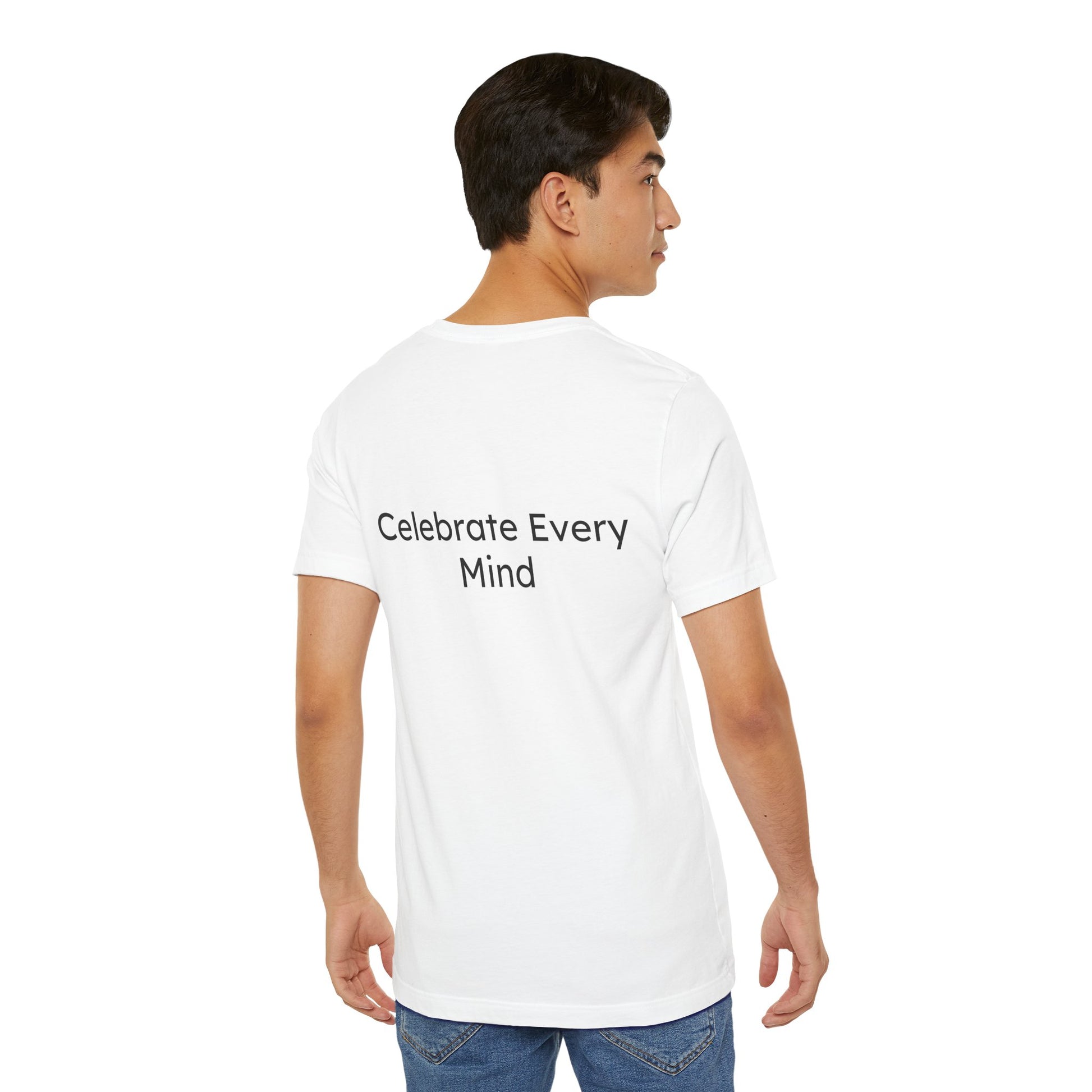Person wearing a white t-shirt with 'Celebrate Every Mind' text on the back, standing against a white background.