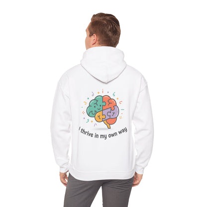 Person wearing a white hoodie with a colorful brain design and text on the back.