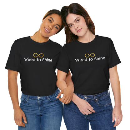 Two people wearing black t-shirts with 'Wired to Shine' text and logo on a white background