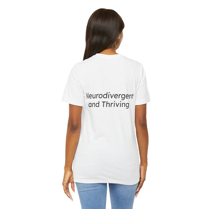 Person wearing a white t-shirt with 'Neurodivergent and Thriving' text on the back.