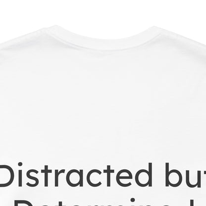 White t-shirt with black text 'Distracted but Determined' on a white background