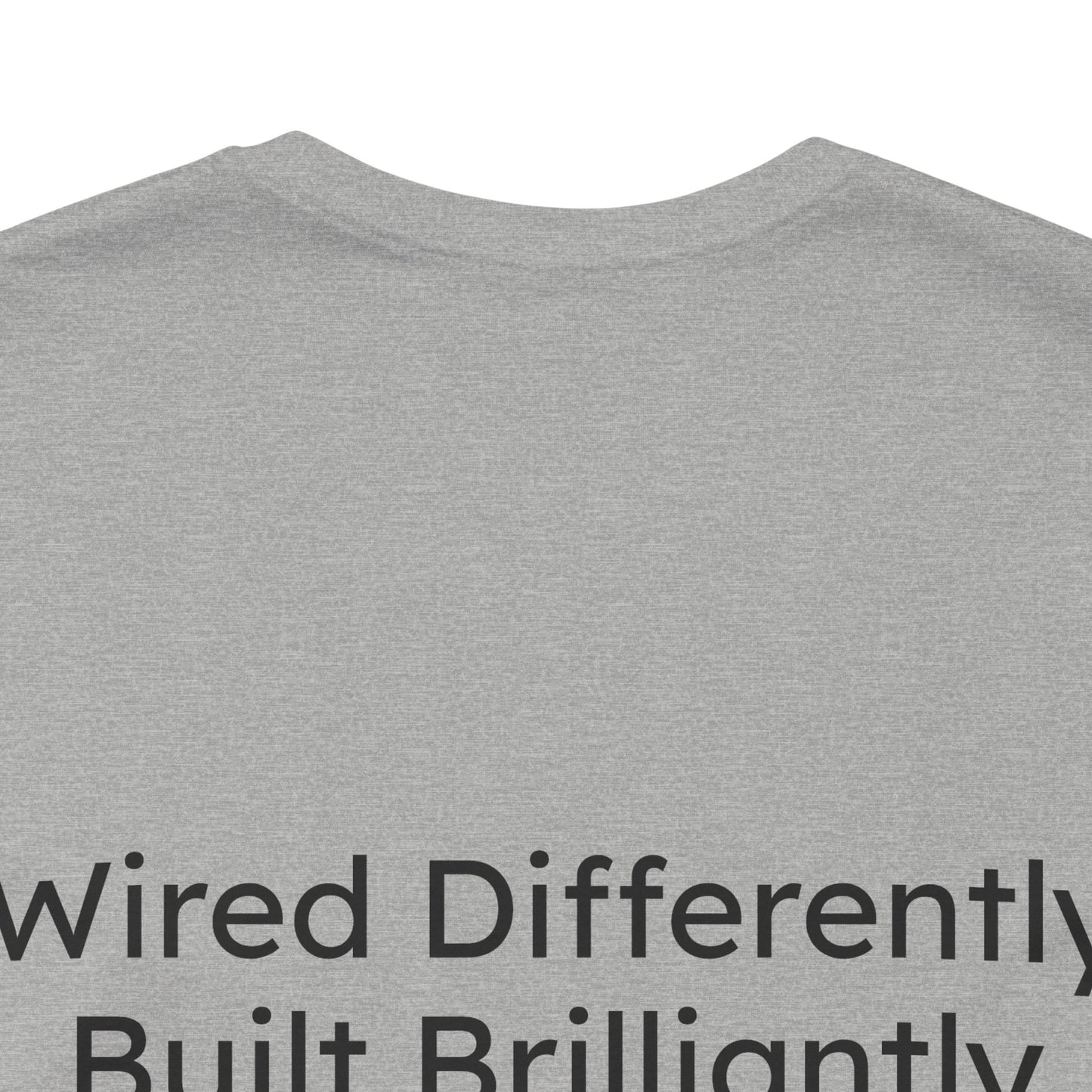Gray t-shirt with text 'Wired Differently Built Brilliantly' on a white background