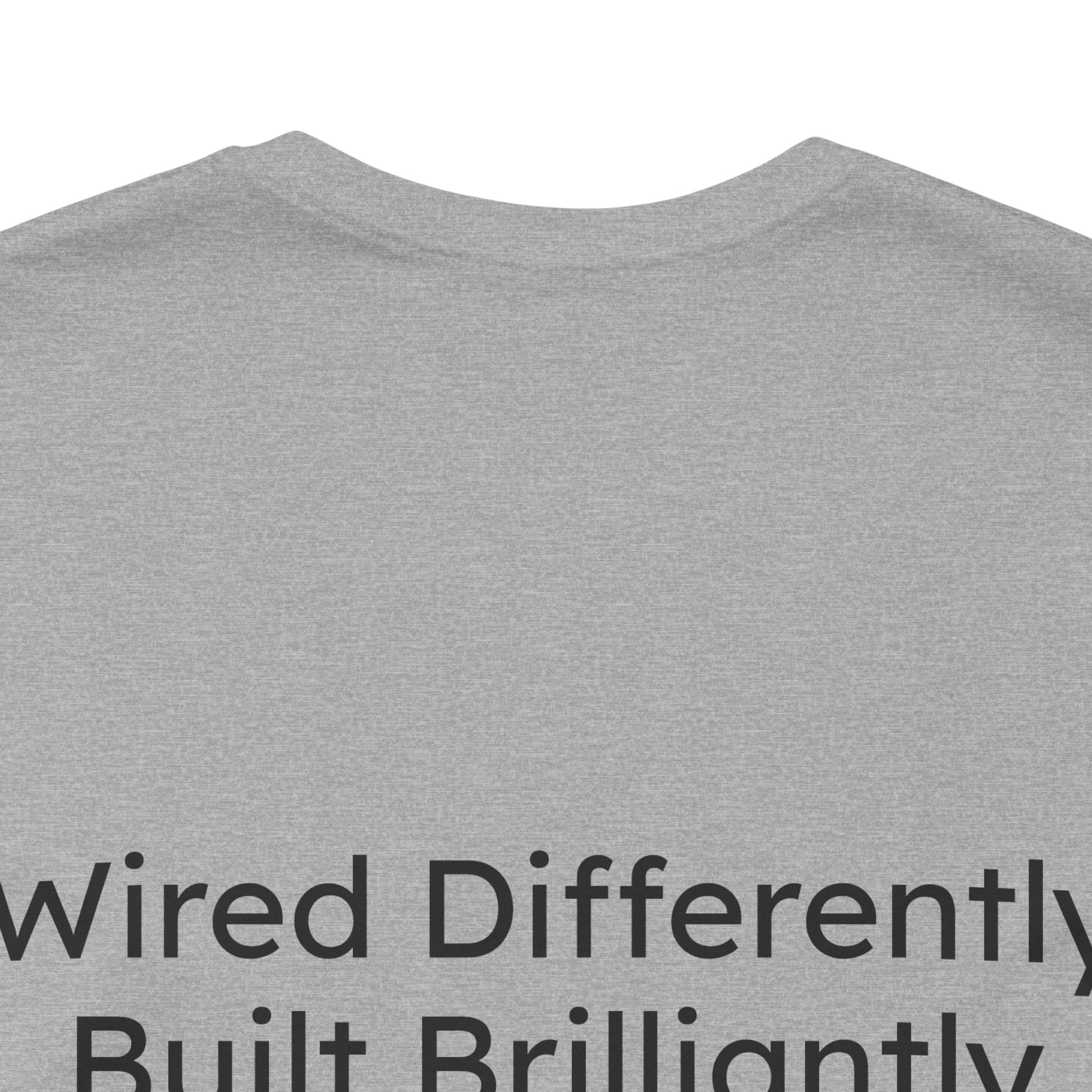 Gray t-shirt with text 'Wired Differently Built Brilliantly' on a white background