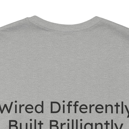 Gray t-shirt with text 'Wired Differently Built Brilliantly' on a white background