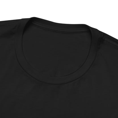 Close-up of a black t-shirt with a plain background