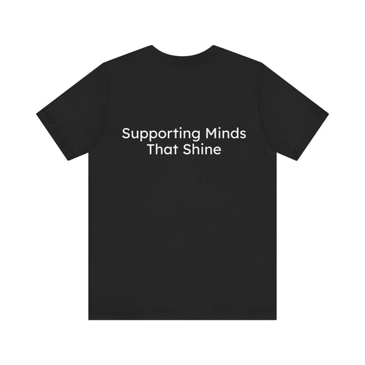 Black t-shirt with 'Supporting Minds That Shine' text on a white background
