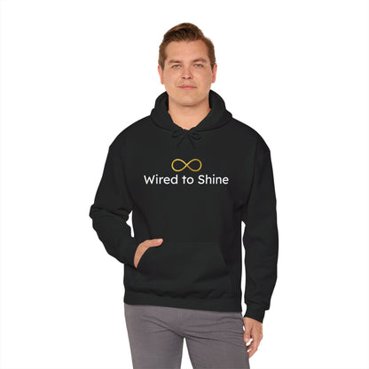 Person wearing a black hoodie with 'Wired to Shine' text and infinity symbol on a white background