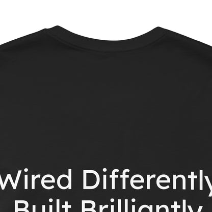 Black t-shirt with white text 'Wired Differently Built Brilliantly' on a white background