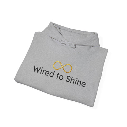 Folded gray hoodie with 'Wired to Shine' logo on a white background