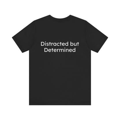 Black t-shirt with 'Distracted but Determined' text on the back against a white background