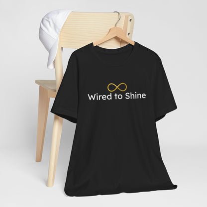 Black t-shirt with 'Wired to Shine' text and infinity symbol on a white background