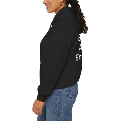 Person wearing a black hoodie with text on the back, standing against a white background