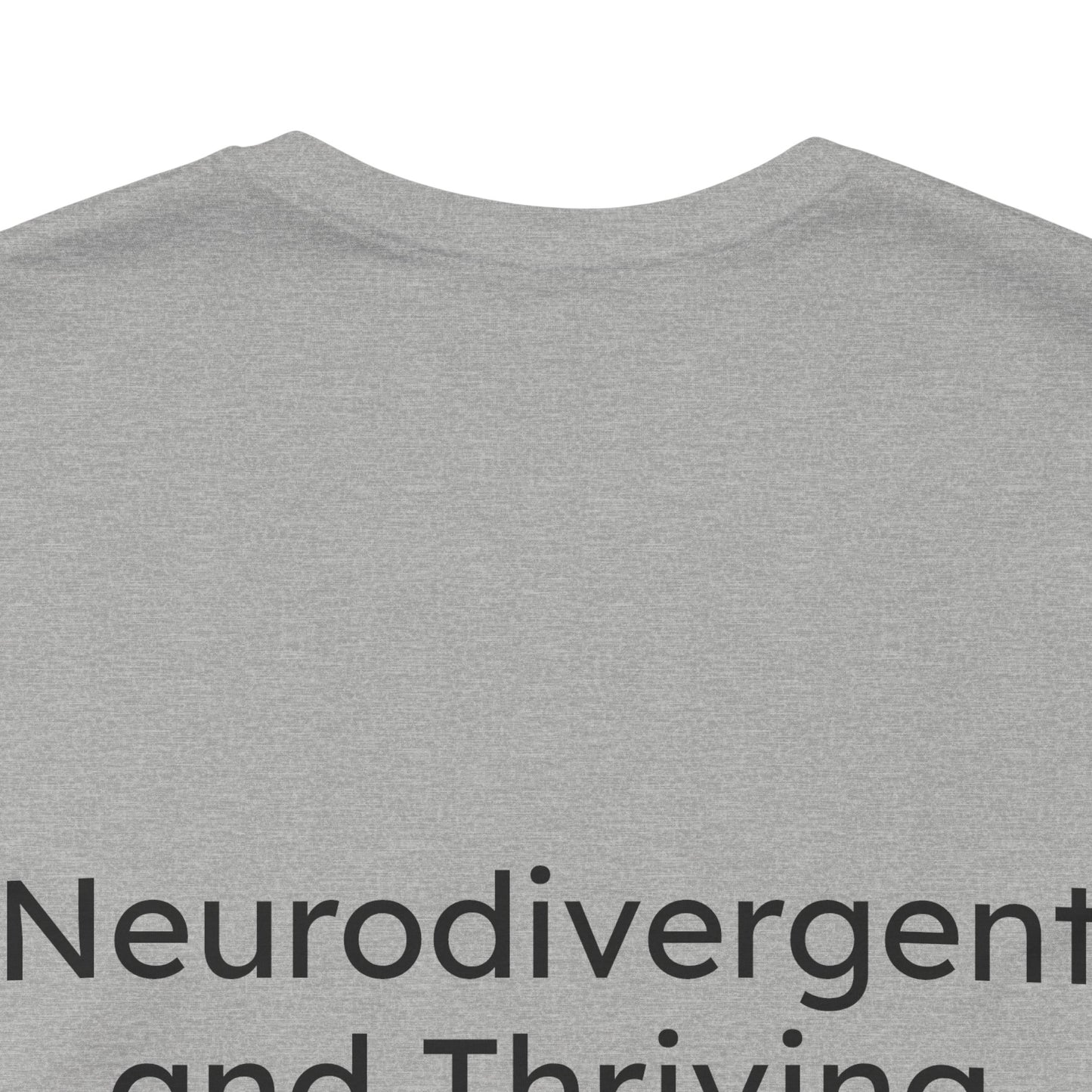 Gray t-shirt with 'Neurodivergent and Thriving' text on a white background