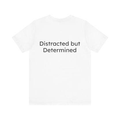 White t-shirt with 'Distracted but Determined' text on a white background