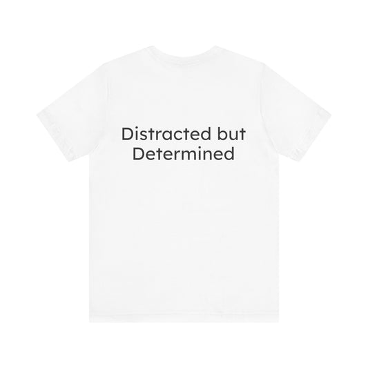White t-shirt with 'Distracted but Determined' text on a white background